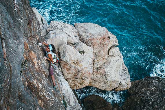 Sail and climb in Positano, Amalfi Coast Italy. Faragliori